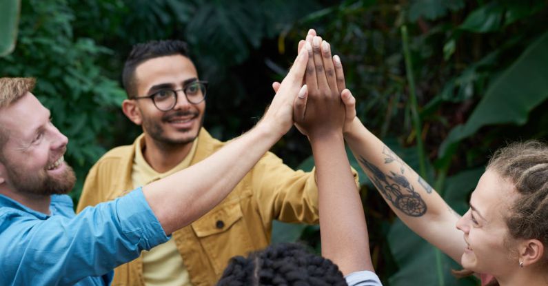 Assistance - Photo of People Putting Their Hands Up