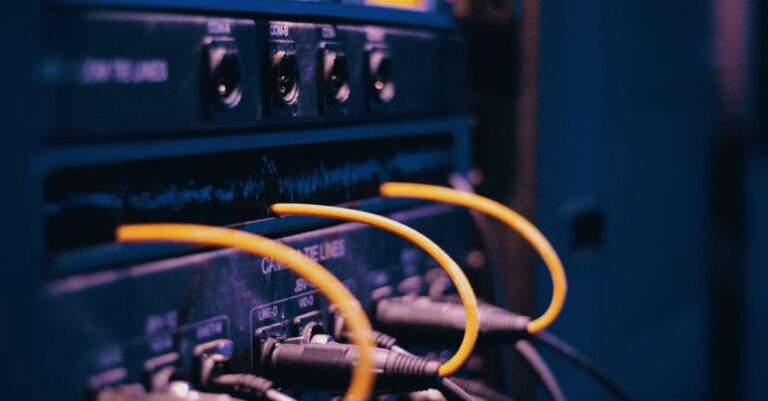 Services - Ethernet Cables Plugged on a Server Rack