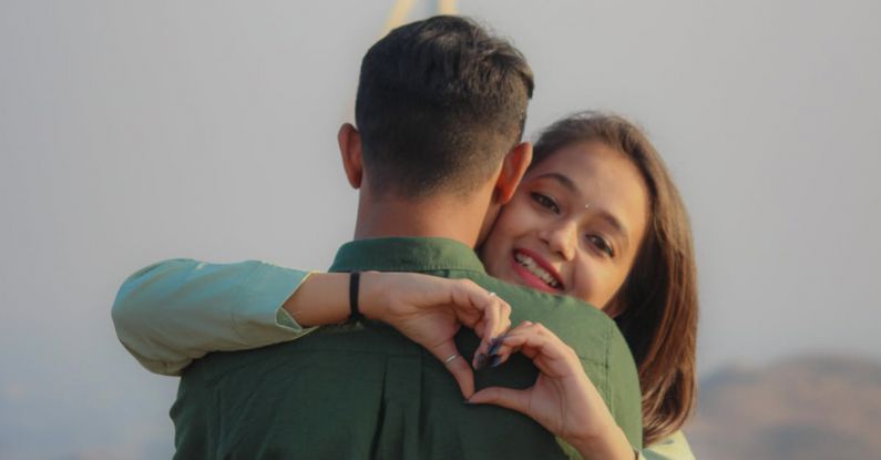 Resources - Young Couple Hugging