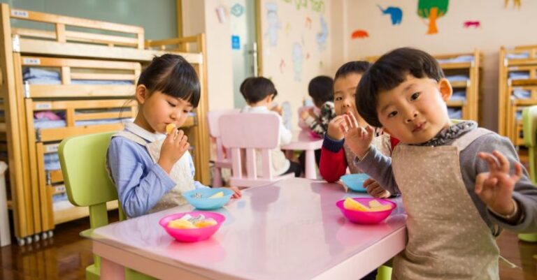 Preschool - Three Toddler Eating on White Table